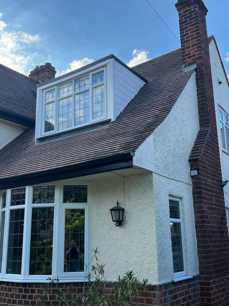 This is a photo of a dormer window which has just had some repairs carried out where the roof and the dormer meet. Works carried out by Clay Cross Roofing Repairs